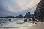Rocks and cliff along La Franca Beach Asturias Spain
