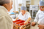 Chef and students with Down Syndrome baking bread