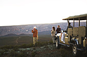 Safari tour group enjoying landscape view South Africa
