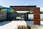 Sunny, modern luxury home showcase exterior