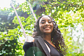 Portrait beautiful woman on swing
