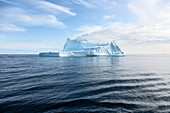 Majestic iceberg formation on blue