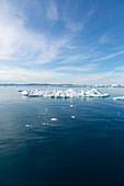 Polar ice melting on blue Atlantic Ocean Greenland