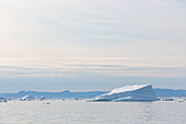 Icebergs on tranquil Atlantic Ocean Greenland