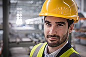 Portrait confident male supervisor in factory