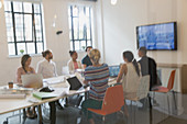 Architects meeting in conference room meeting