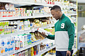 Man shopping in supermarket