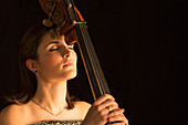Serene woman with double bass