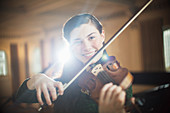 Portrait of violinist performing