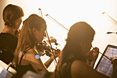 Silhouette of orchestra performing