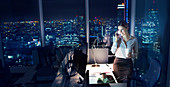 Businesswoman working late in office