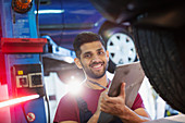 Portrait confident, smiling male mechanic