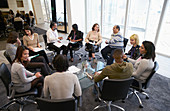 Business people talking in circle
