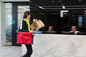 Messenger delivering lunch to business office