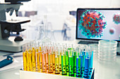 Multicolour vials on laboratory table