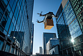 Drone delivering packages, London, UK