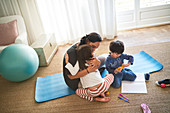 Affectionate family playing and exercising