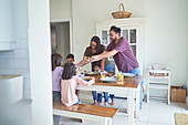 Family eating at dining table