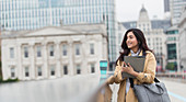 Businesswoman with digital tablet and coffee