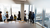 Business people talking meeting, London