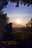 Couple enjoying scenic sunset in nature