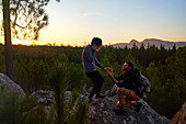 Young man with engagement ring proposing