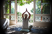 Senior woman practicing yoga