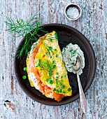 Pea omelette with salmon and dill cream