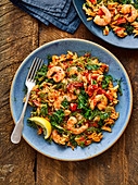 Baked orzo with harissa prawns