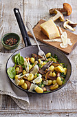 Potato gnocchi with mushrooms and spinach