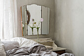 Antique trifold mirror in the bedroom