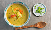 Prawn soup with coconut milk and curry