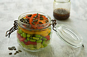 Vegan salad with edamame in a jar