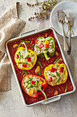 Stuffed peppers on tomatoes