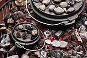 Dutch oven on coals on a grill