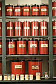 Labeled cans in an antique pharmacy