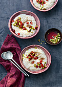 Turkish rice pudding with pistachio nuts and pomegranate seeds