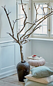 Spring tree with DIY paper leaves in floor vase