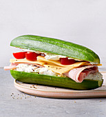 A cucumber sandwich with ham and cheese