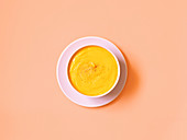 Bowl of pumpkin cream soup