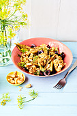 Indian cauliflower salad with cashew nuts and cherries
