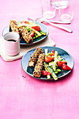 Edamame salad with tofu, strawberries and kafir lime leaves