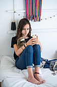 Teenage girl using a Smartphone