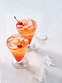 Tequila cocktail with orange juice and grenadine