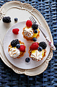 Lemon cream tartlets with fresh berries