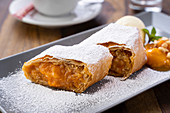 Apricot strudel with icing sugar