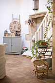 Mediterranean living room with nostalgic decor and terracotta tiles