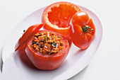 A stuffed tomato filled with bolognese sauce