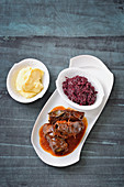 Braised venison roulade with red cabbage and mashed potatoes