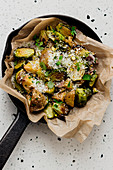 Potatoes and Brussels sprouts in parchment paper